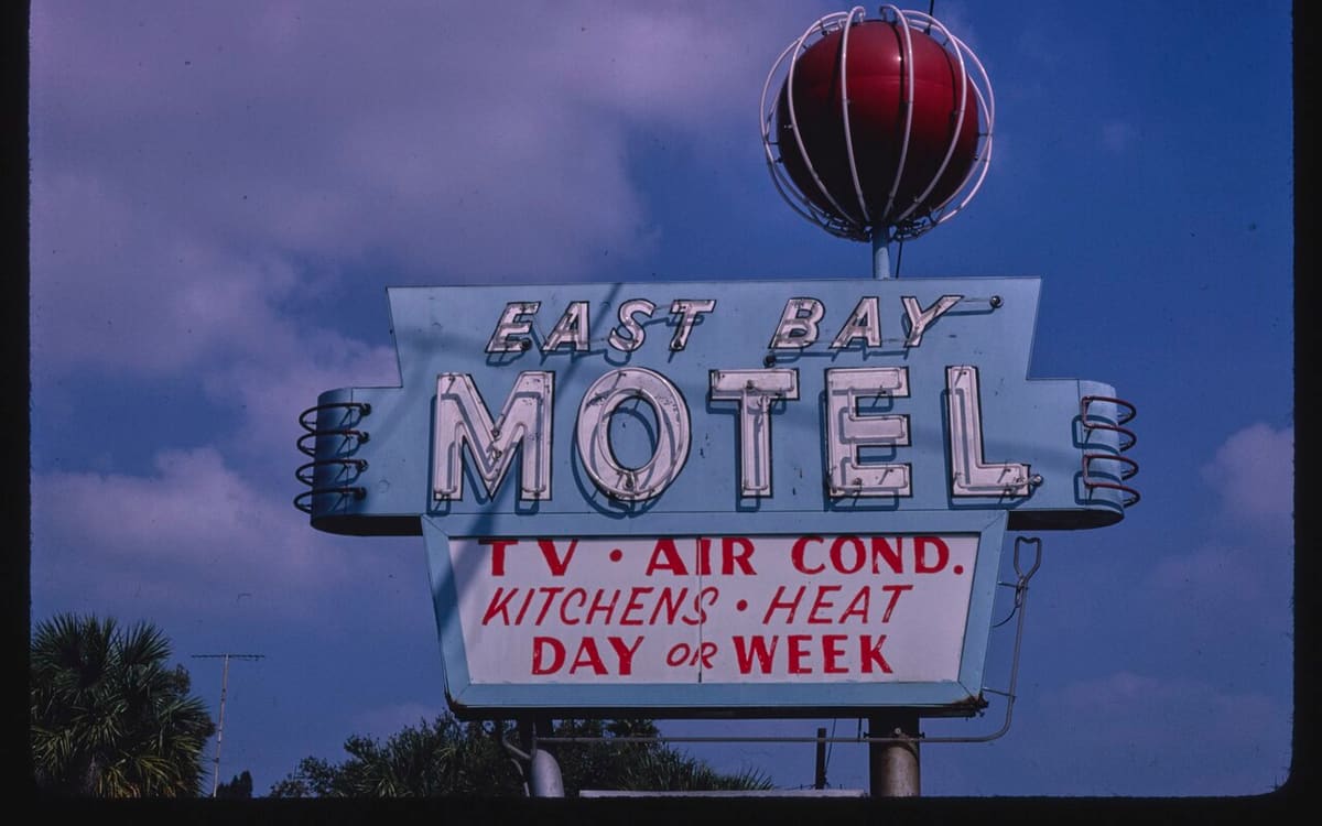 AC repair and heating service in Gibsonton, FL by Lightning Fast A/C & Heating, the classic East Bay Motel sign on Route 41